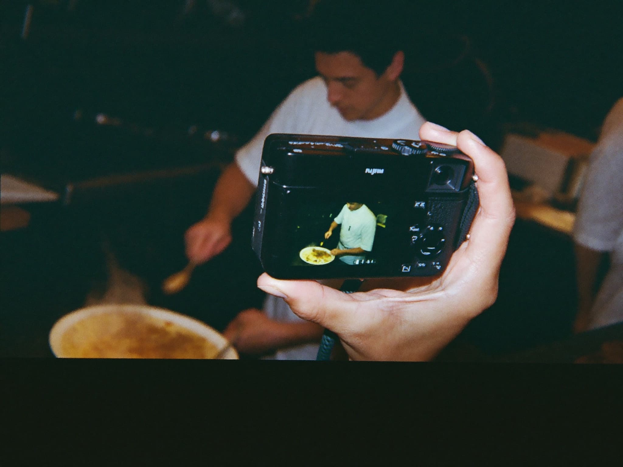Wide BTS — camera rig, chef plating, restaurant interior
